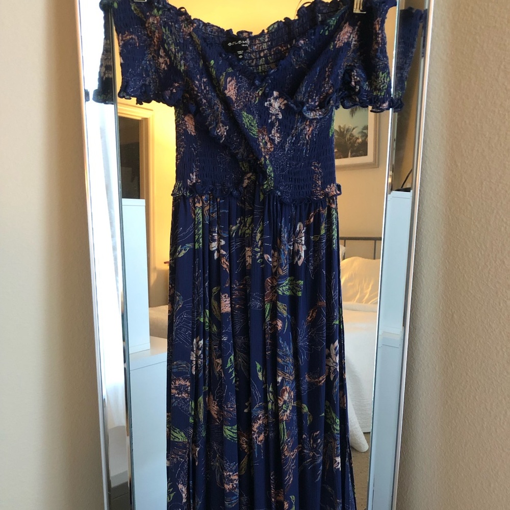 Off the shoulder dress.